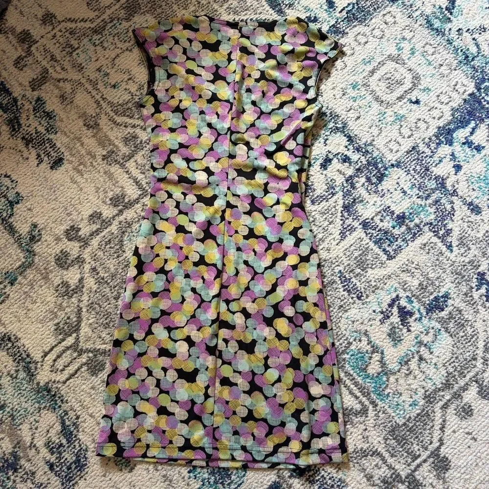 Connected multicoloured polka dot dress with a tie waist.‎ Size: S
